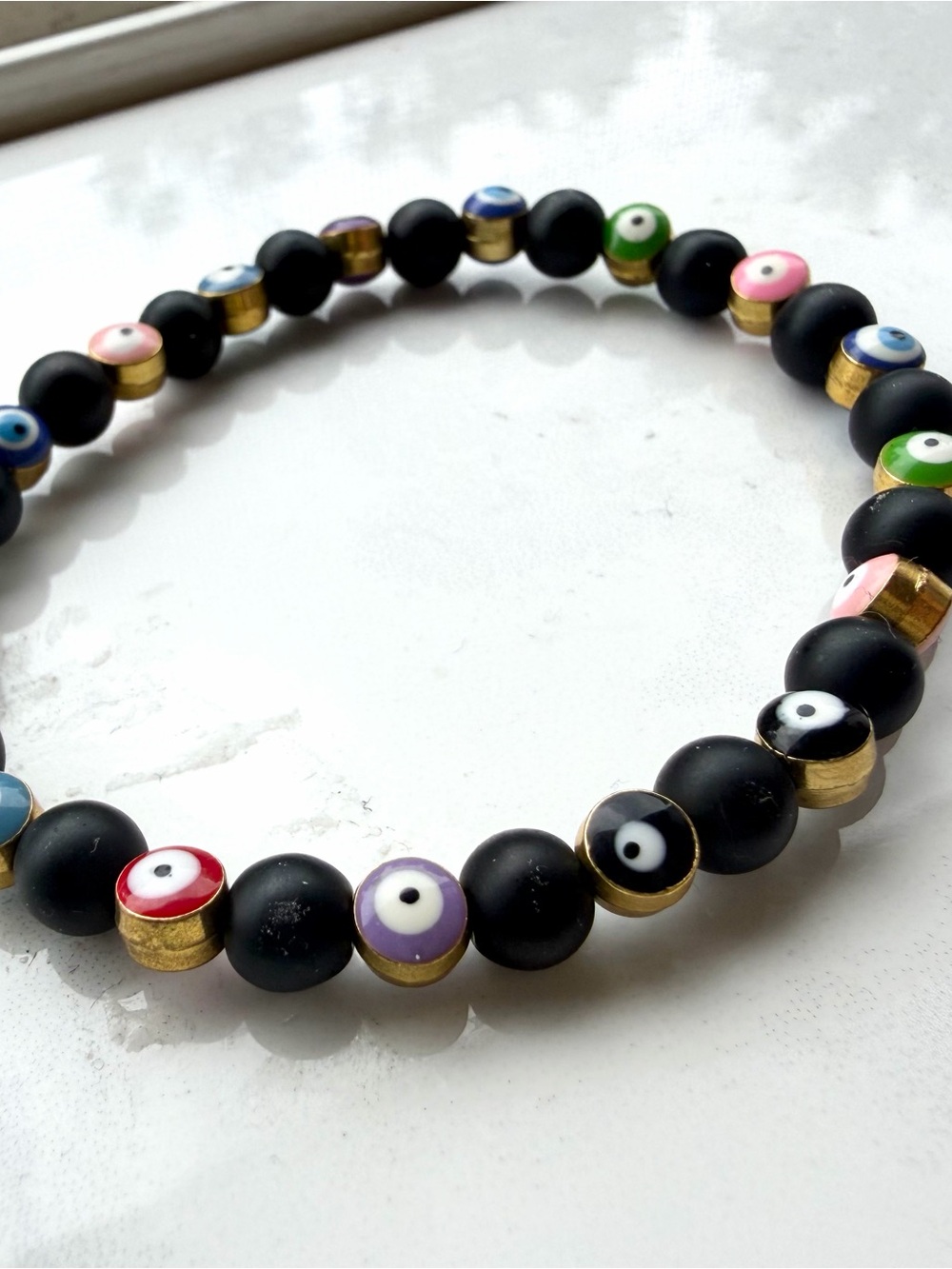 Matte Black Evil Eye Beaded Stretch Bracelet with Colorful Accents